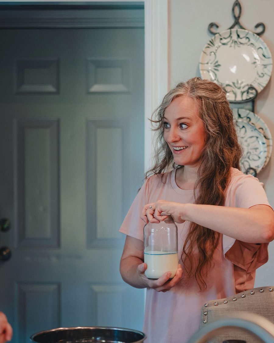 Rachel laughing while checking on the starter